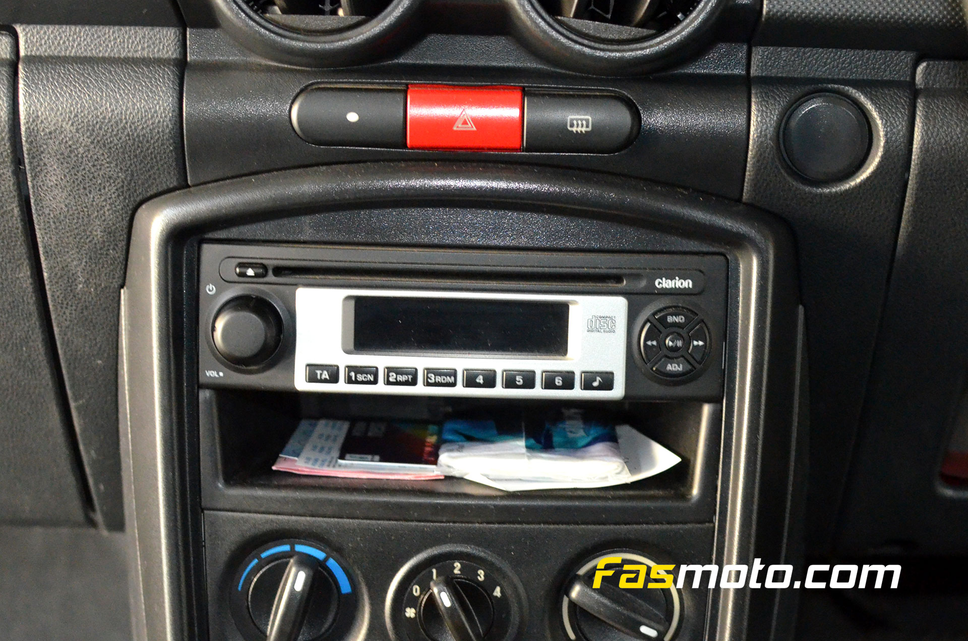 Closer look at the factory standard Clarion head unit.